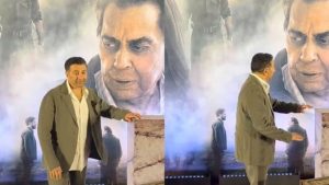 Sunny Deol Gets Emotional Posing With Dad Dharmendra’s Poster At Ikkis Screening Sunny Deol Gets Emotional Posing With Dad Dharmendra’s Poster At Ikkis Screening