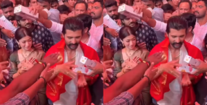 Rashmika & Vijay Distribute Sweets At Tirumala After Marriage; Fans Call It A Rare Gesture Rashmika & Vijay Distribute Sweets At Tirumala After Marriage; Fans Call It A Rare Gesture